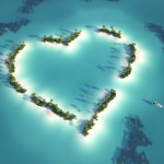 Aerial view of heart shaped island with yacht as concept for romantic vacation